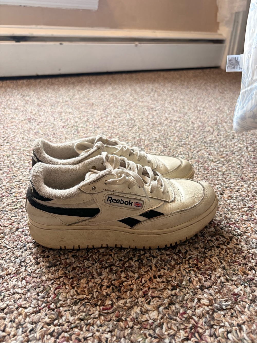 Reebok Cream and Black Low-Top Sneakers